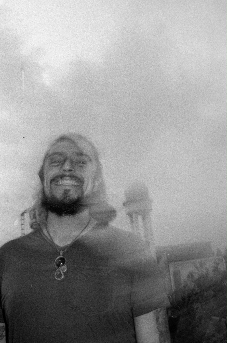 Black and white film portrait of Ro laughing